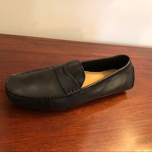 Never worn!!!  Black Cole Haan driving shoe.